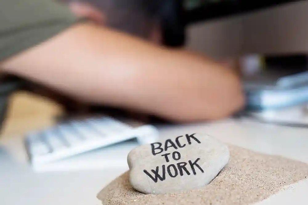 end of bleisure trip and back to work painted on a rock